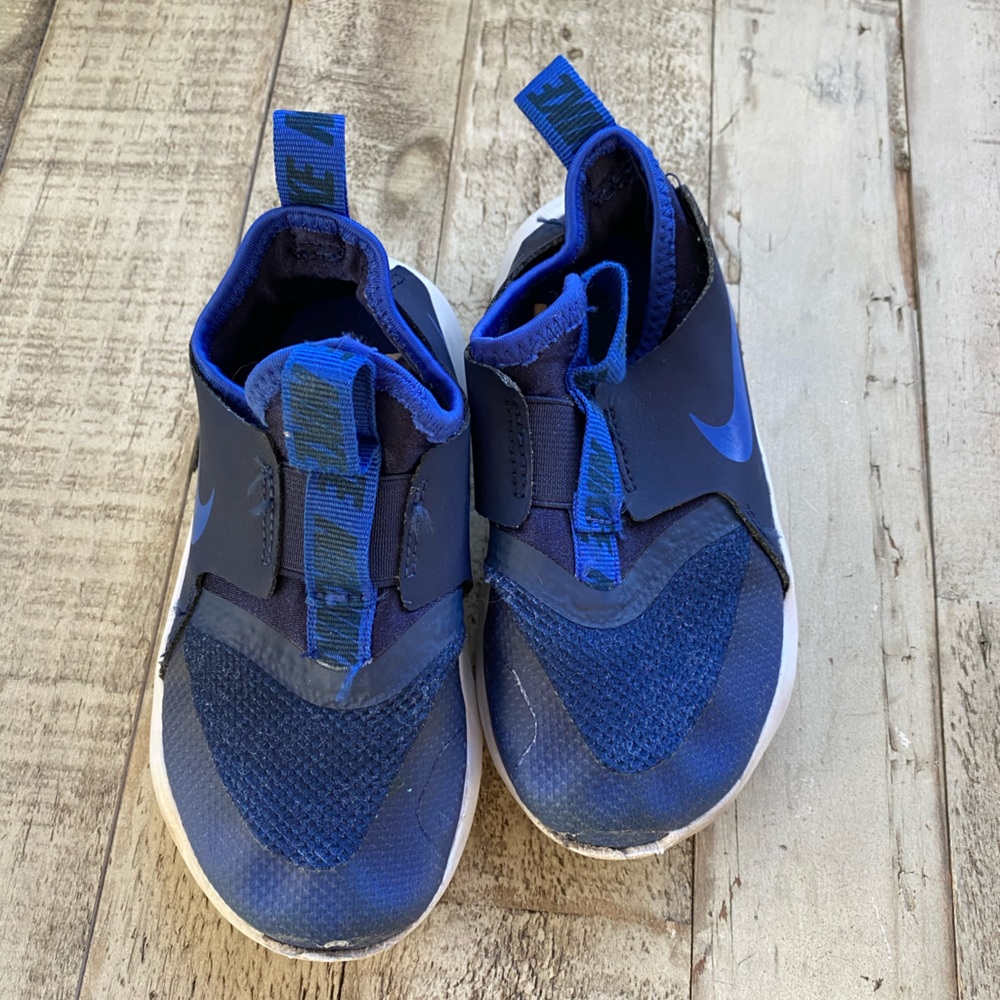 Nike navy and blue slip on sneakers. Toddler size 9.